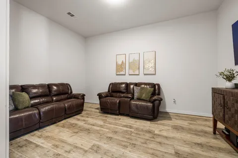 a living room with furniture and a couch