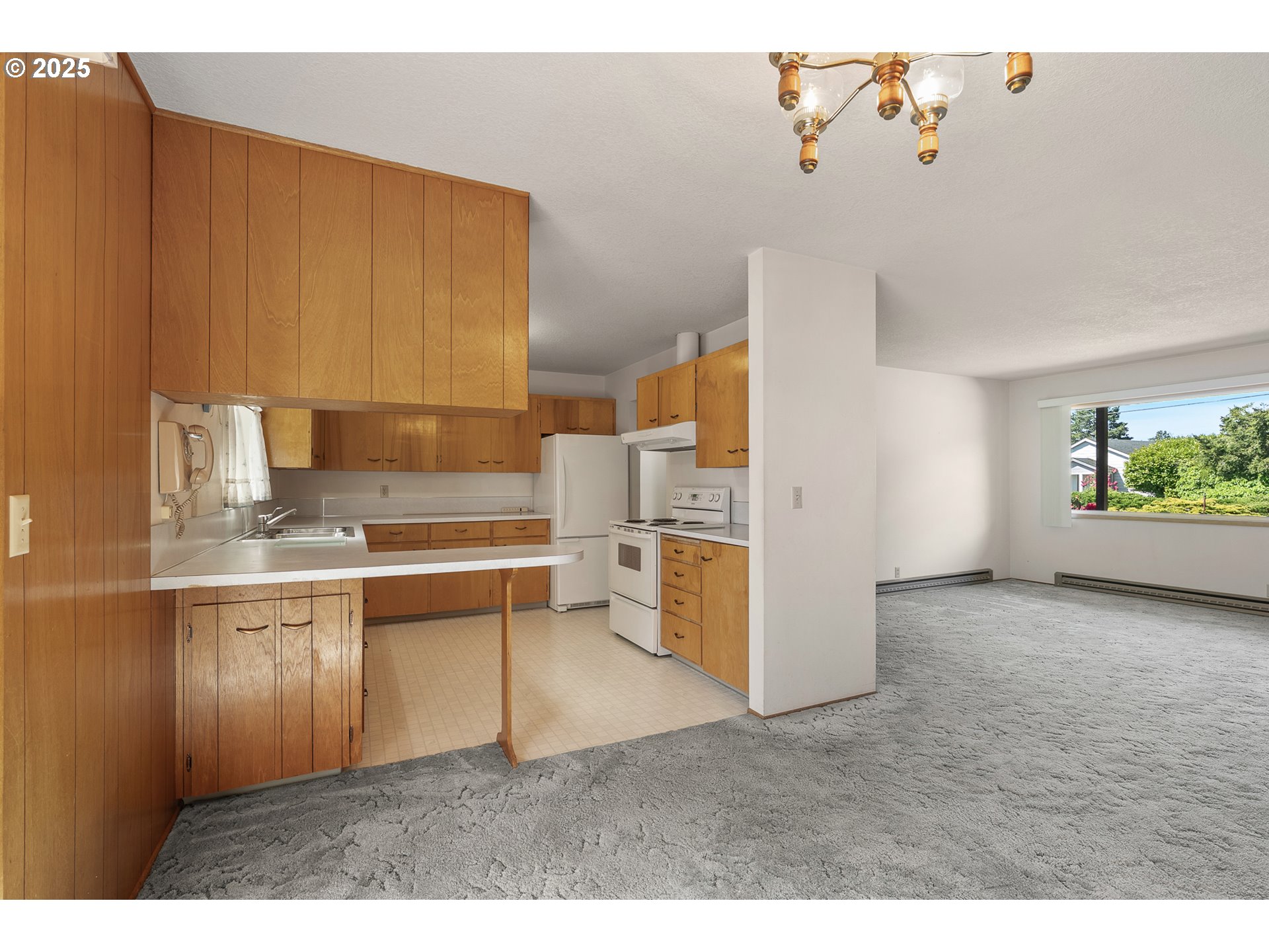 1088 Nopal Street Florence, OR 97439 - Photo 11 of 37 a kitchen with a sink cabinets and appliances