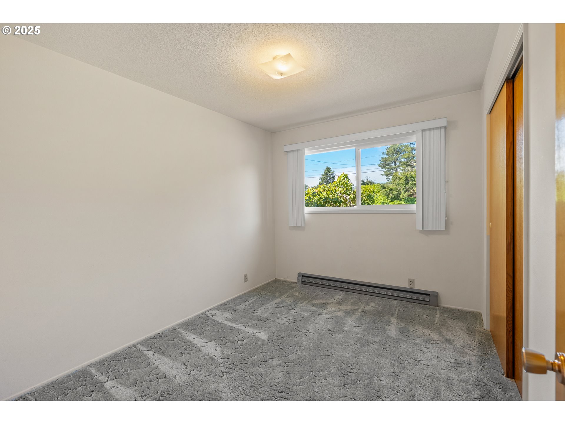 1088 Nopal Street Florence, OR 97439 - Photo 24 of 37 an empty room with windows