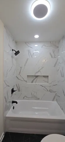 a bathroom with a bathtub