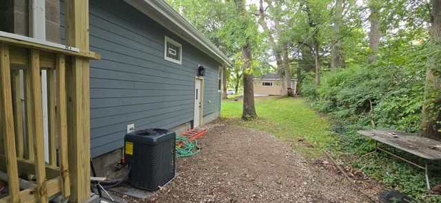 a view of a back yard of the house