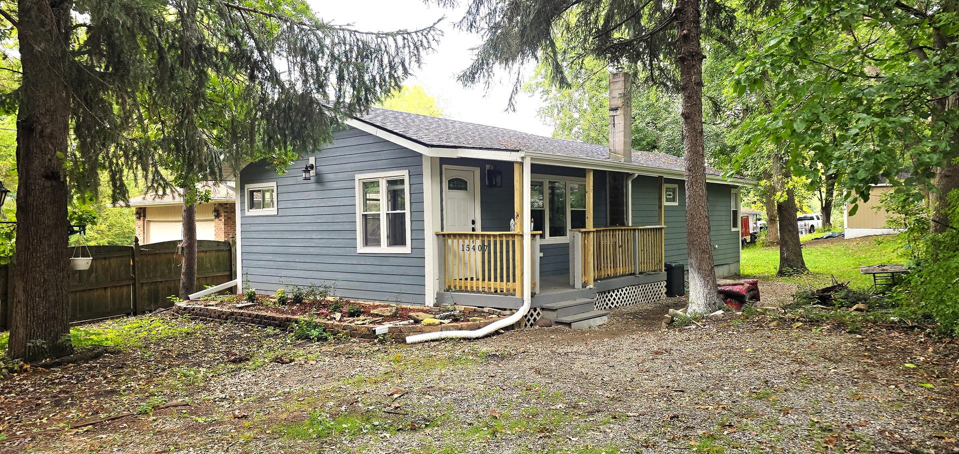 15407 Kenton Avenue Oak Forest, IL 60452 - Photo 2 of 20 a view of a backyard with a tree