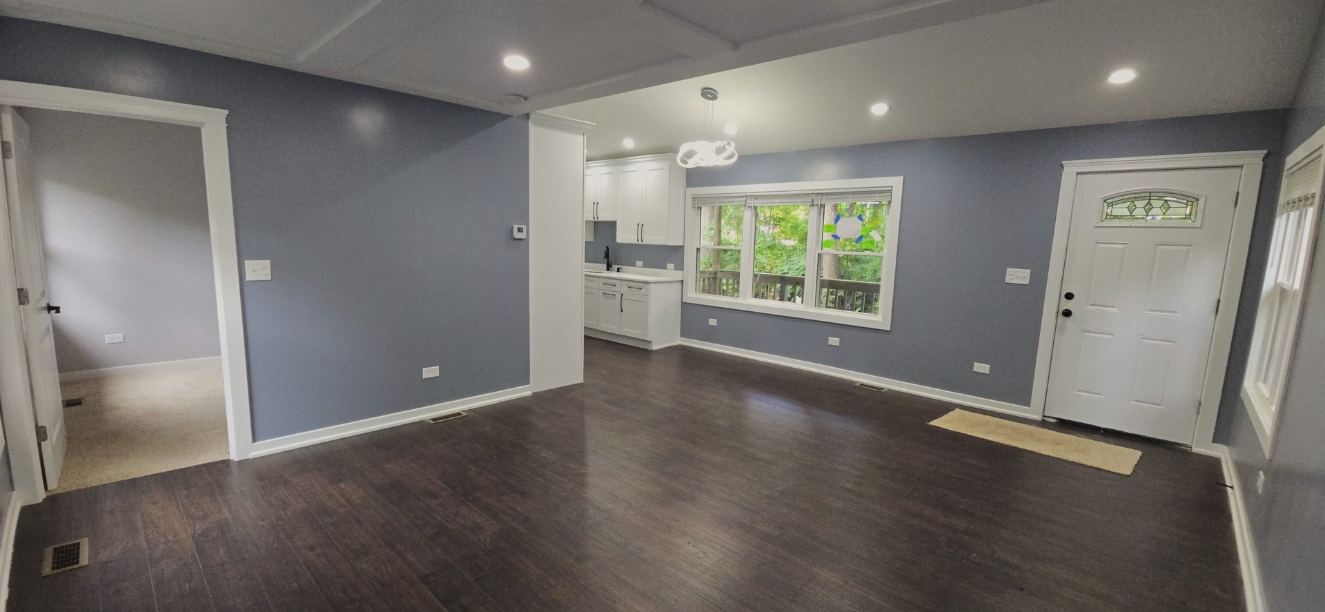 15407 Kenton Avenue Oak Forest, IL 60452 - Photo 5 of 20 an empty room with wooden floor and windows