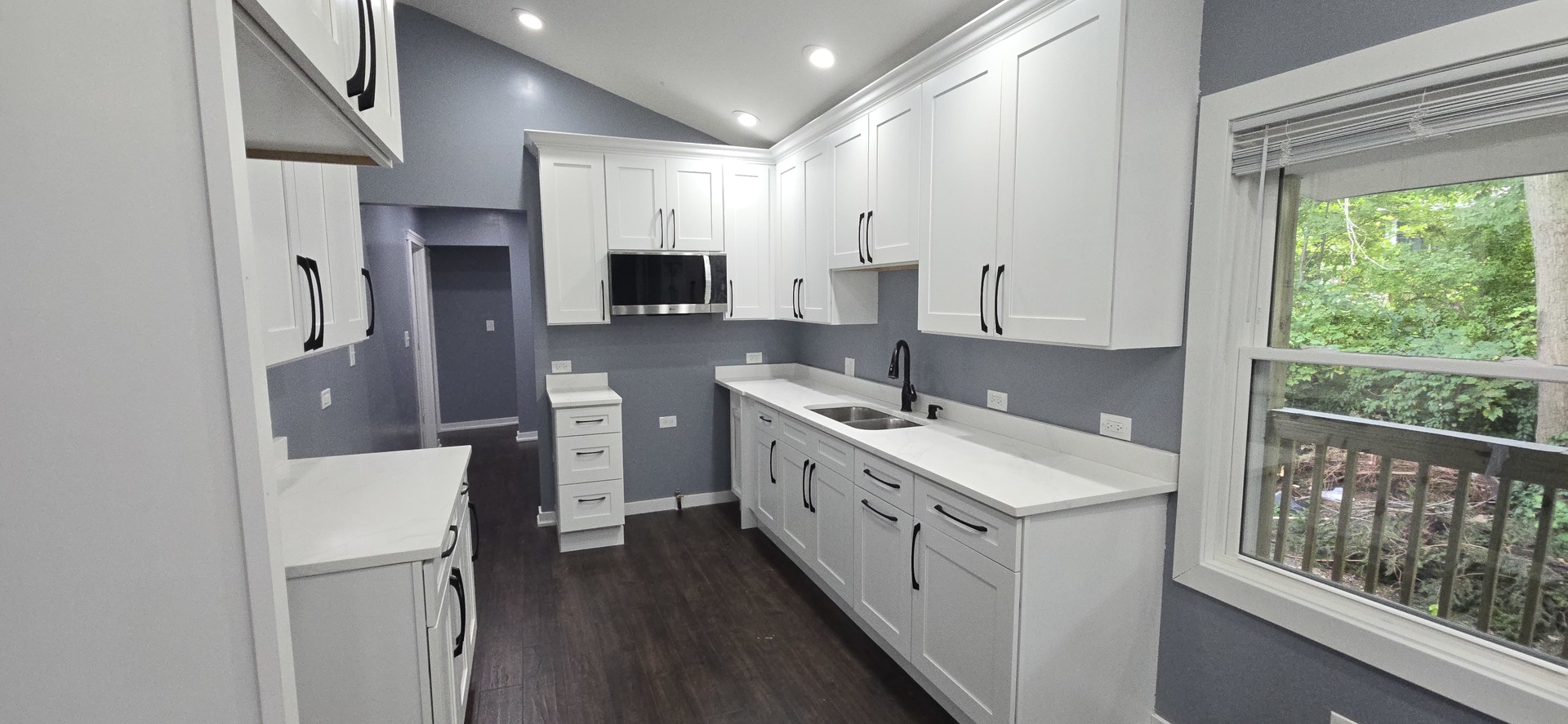 15407 Kenton Avenue Oak Forest, IL 60452 - Photo 6 of 20 a kitchen with a sink stove and refrigerator