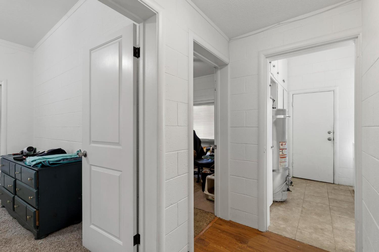 724 Webster Street Colusa, CA 95932 - Photo 20 of 48 a view of a kitchen with refrigerator and wooden floor