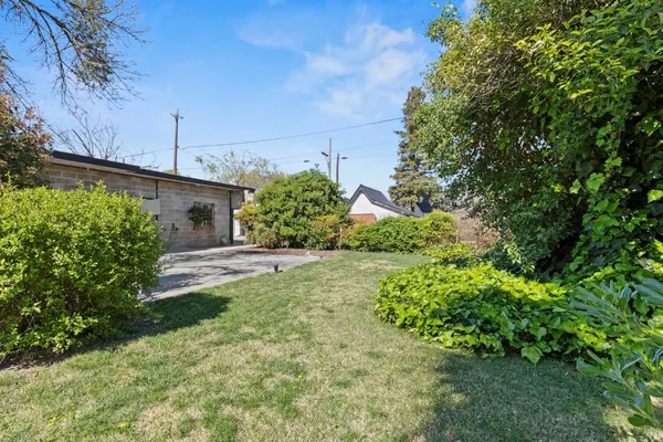 a view of a back yard of the house