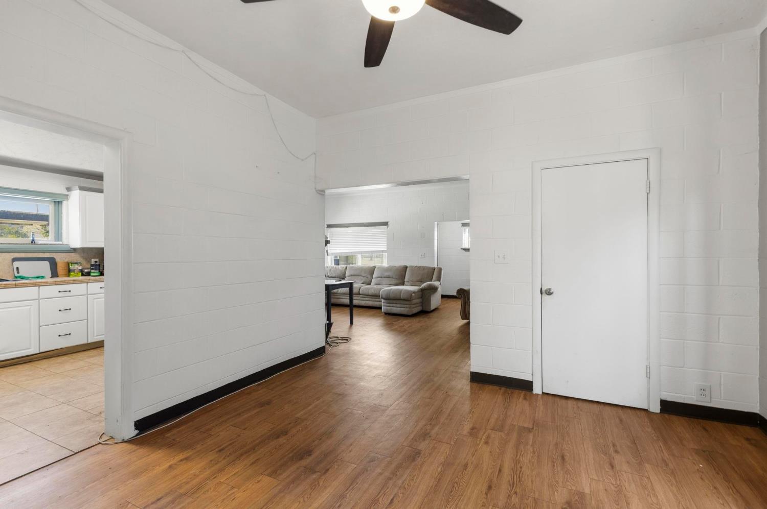 724 Webster Street Colusa, CA 95932 - Photo 8 of 48 a living room with furniture and a wooden floor