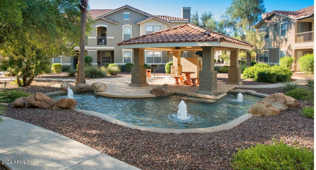 5120 East Hampton Avenue, Unit 1 Mesa, AZ 85206 - Photo 16 of 17 a view of a house with outdoor space
