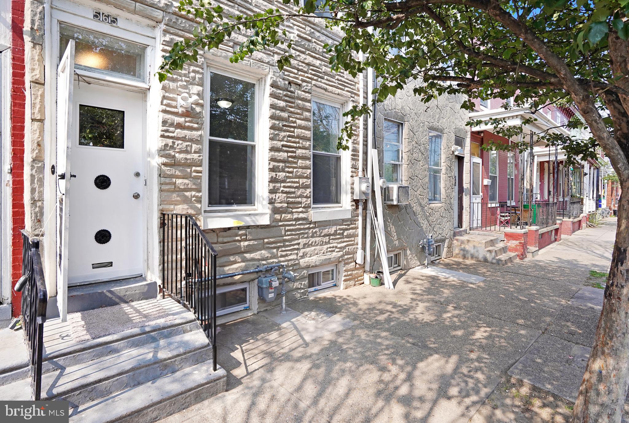 a view of a house with a door and a outdoor space