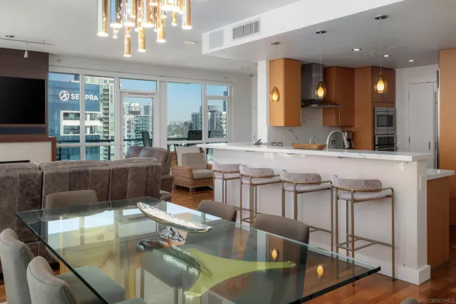 a kitchen with a stove and a refrigerator