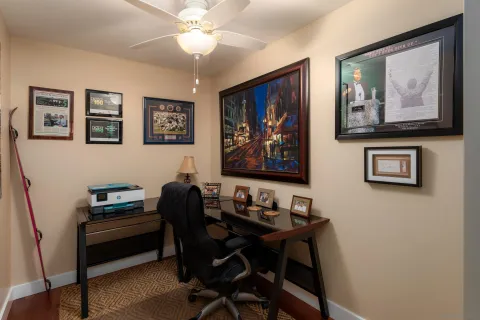 a view of a roof deck with sitting area