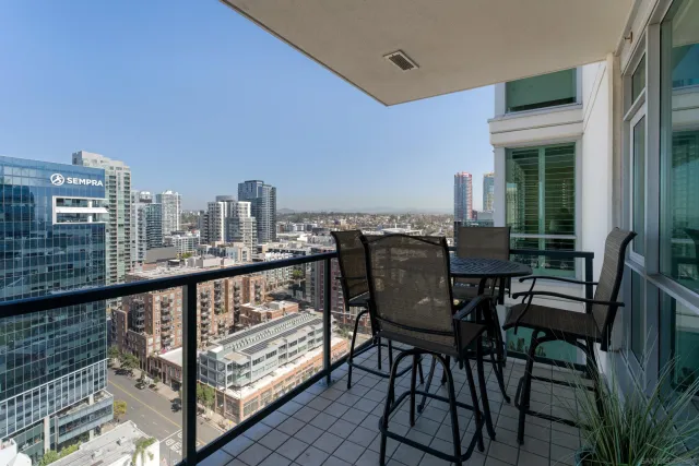 a view of a swimming pool with chairs