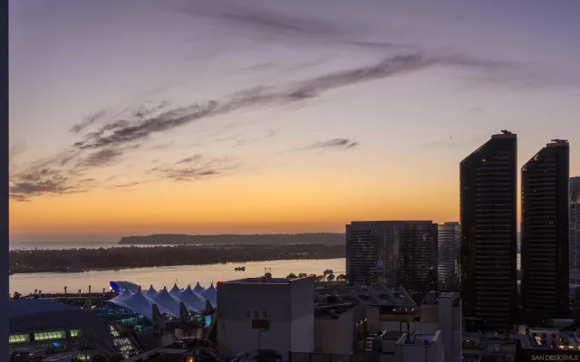 a view of a city with tall buildings