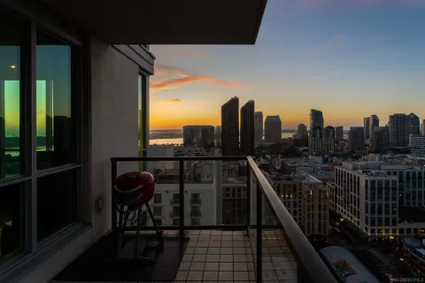 a outdoor space with patio the couches and a flat screen tv