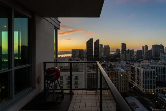 a outdoor space with patio the couches and a flat screen tv