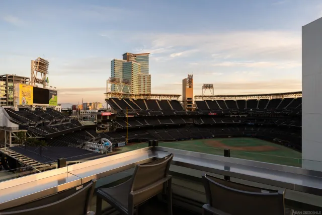 a swimming pool with outdoor seating and yard