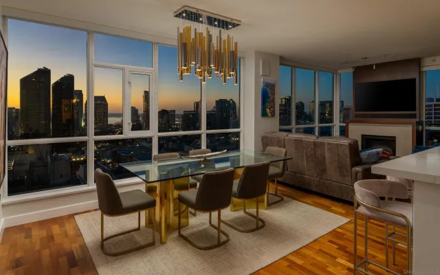 a living room with fireplace furniture and a flat screen tv