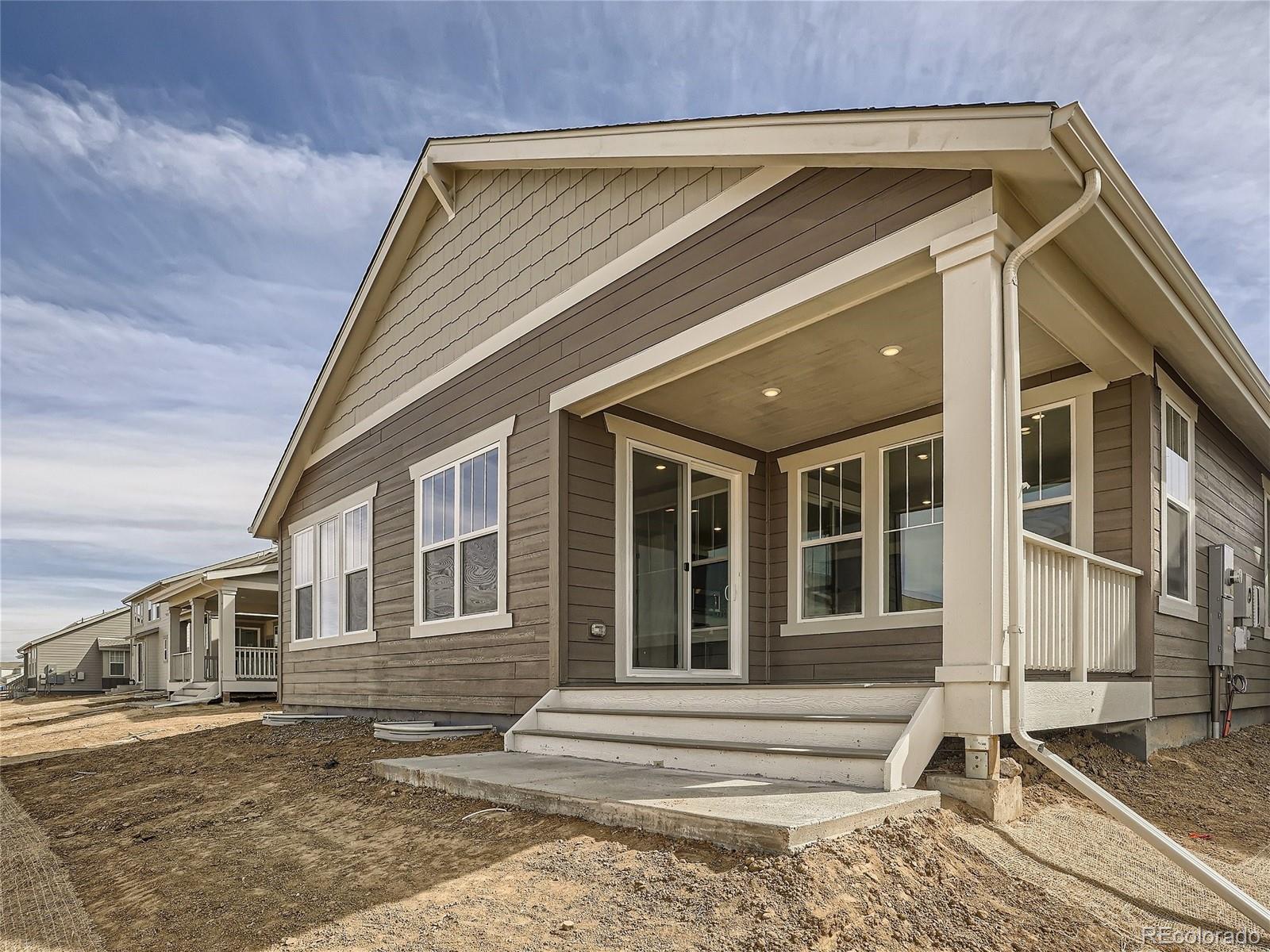 9975 Uvalda Street Commerce City, CO 80022 - Photo 28 of 29 a front view of a house