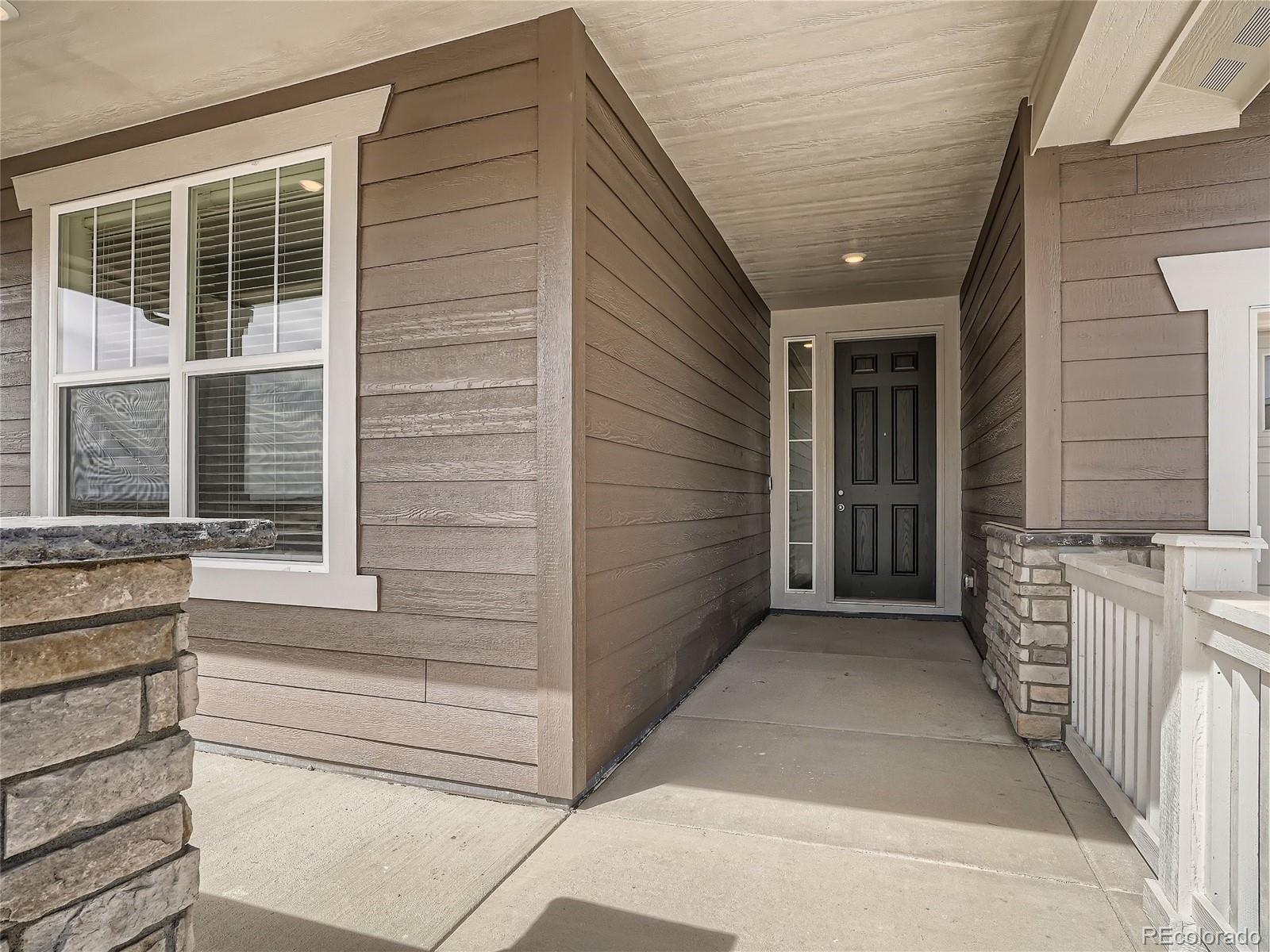 9975 Uvalda Street Commerce City, CO 80022 - Photo 3 of 29 a view of house with a window