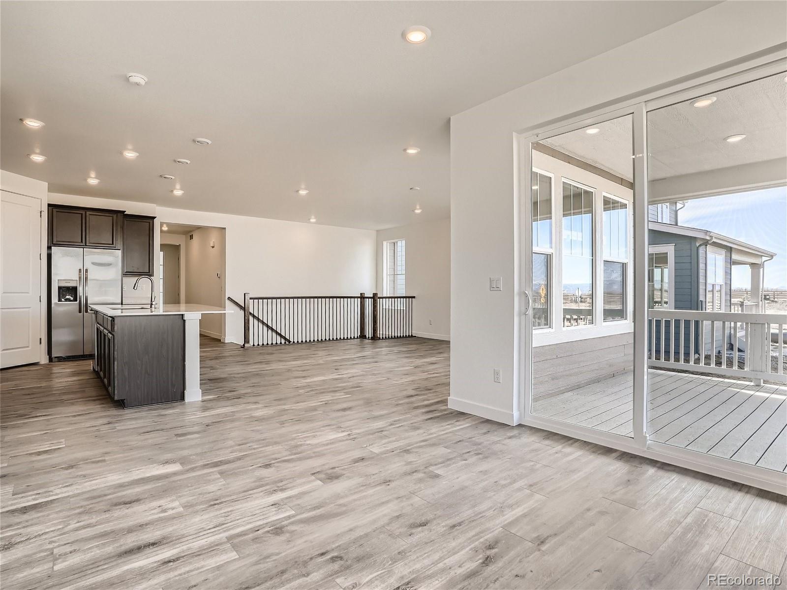9975 Uvalda Street Commerce City, CO 80022 - Photo 9 of 29 a view of a electric appliances in a room
