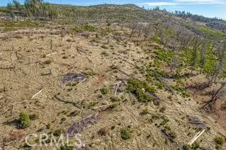 a view of a field with an outdoor space