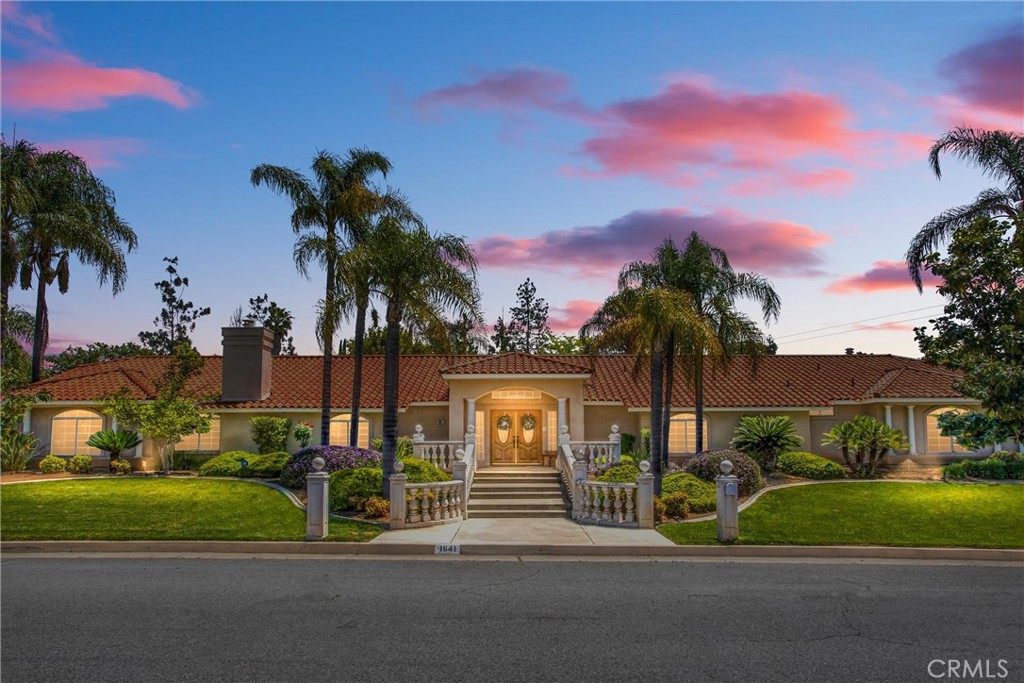 a house view with a garden