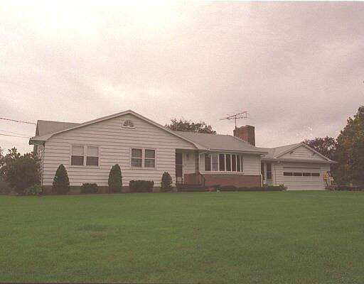 30 Canfield Road Seymour, CT 06483 - Photo 1 of 1 a view of a house with a backyard and a garden