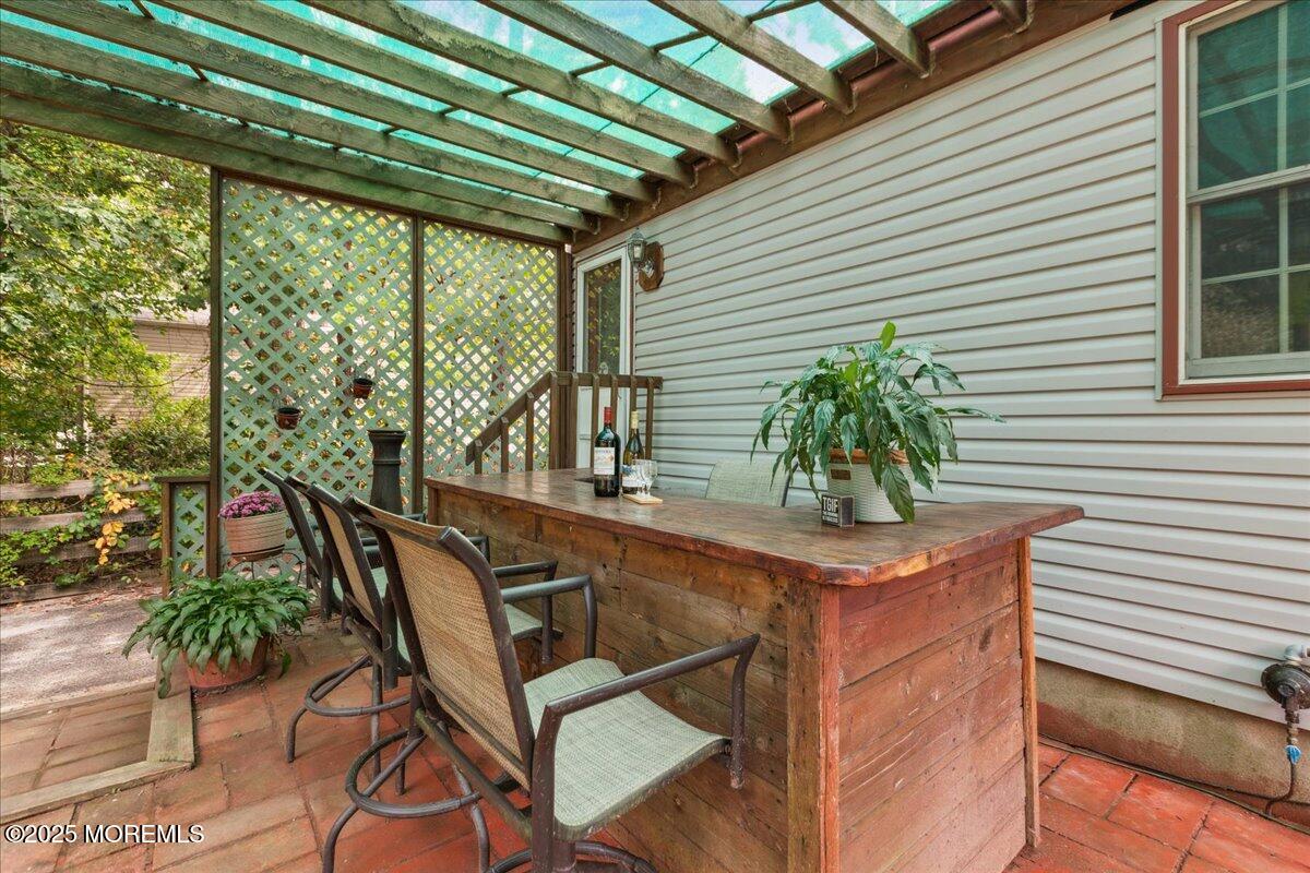 696 Anderson Road Jackson, NJ 08527 - Photo 24 of 34 a potted plant sitting on a wooden floor