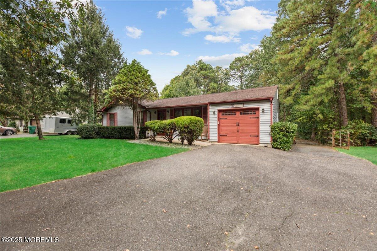 696 Anderson Road Jackson, NJ 08527 - Photo 3 of 34 a view of a house with a back yard