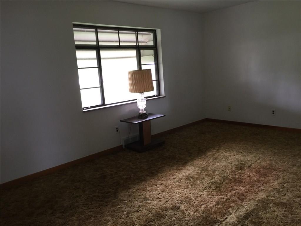 545 Center Hill Road Plum, PA 15239 - Photo 8 of 14 The formal living room is 17x11