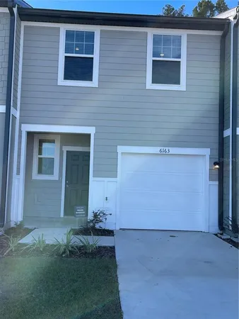 a view of backyard of house