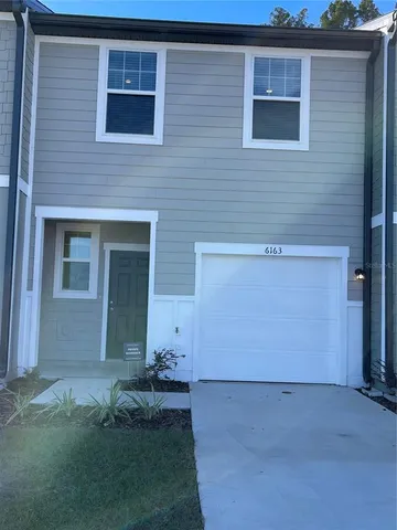 a view of backyard of house