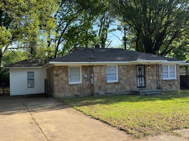 1734 Berwind Road Memphis, TN 38116 - Photo 33 of 40 Ranch-style home with a front lawn, driveway, and stone siding