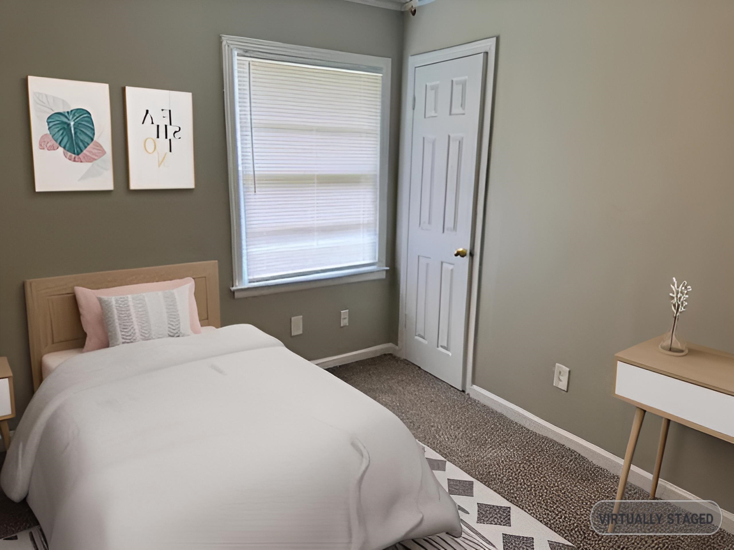 1734 Berwind Road Memphis, TN 38116 - Photo 40 of 40 Carpeted bedroom featuring baseboards