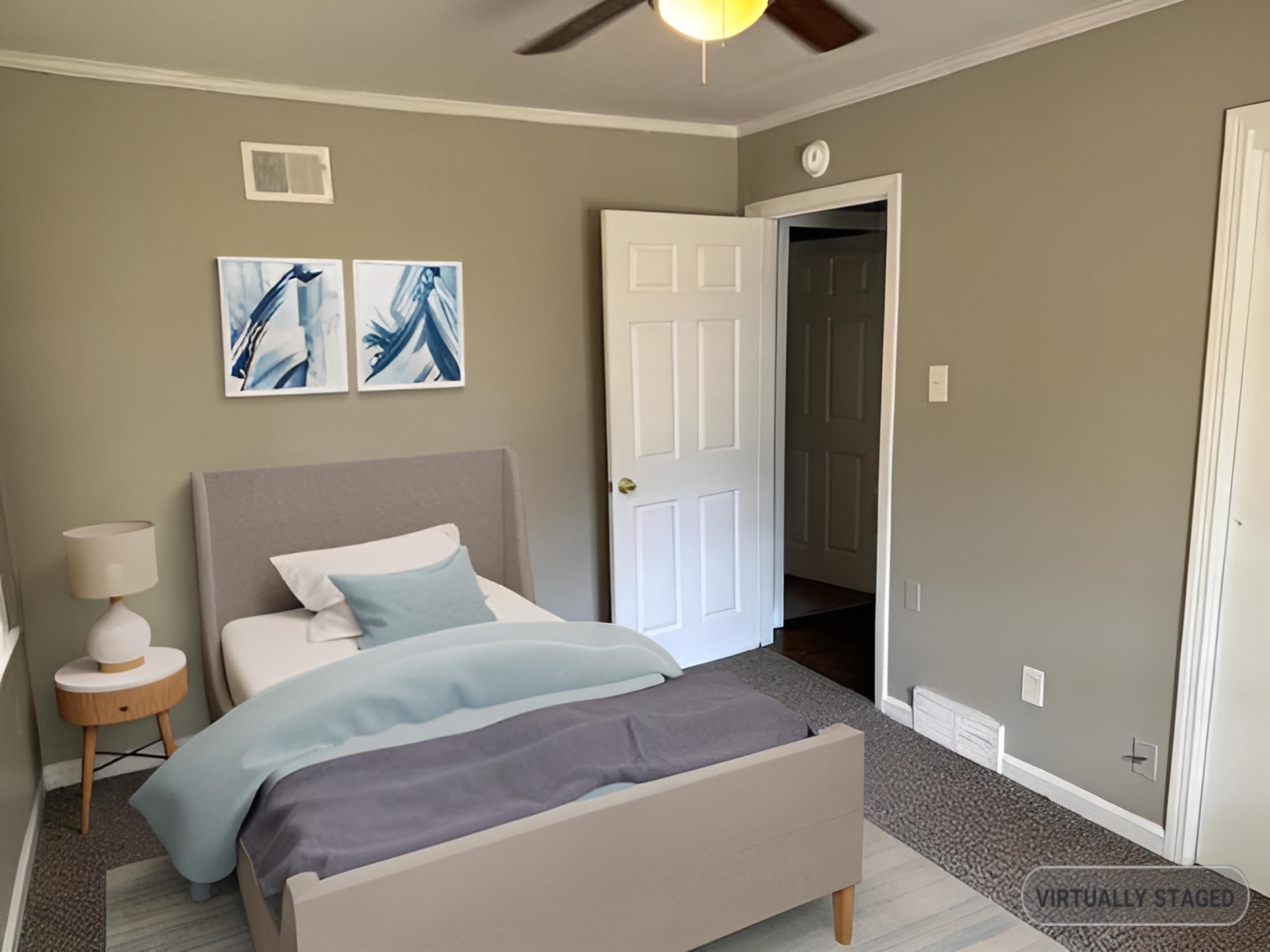 Bedroom with baseboards, crown molding, a ceiling fan, and wood finished floors