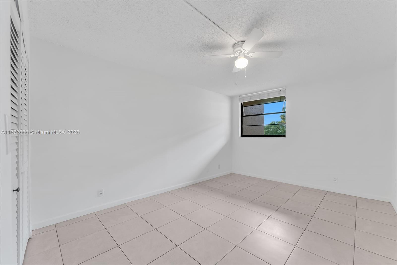 3100 North Pine Island Road, Unit 304 Sunrise, FL 33351 - Photo 15 of 24 a view of an empty room