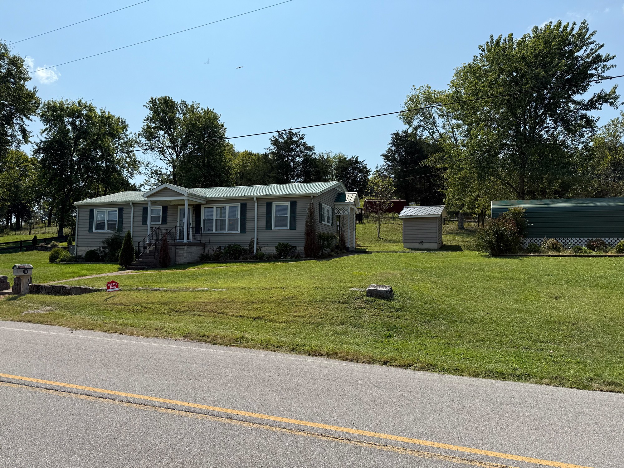 636 Old Alexandria Road Watertown, TN 37184 - Photo 1 of 8 a view of a house with a backyard