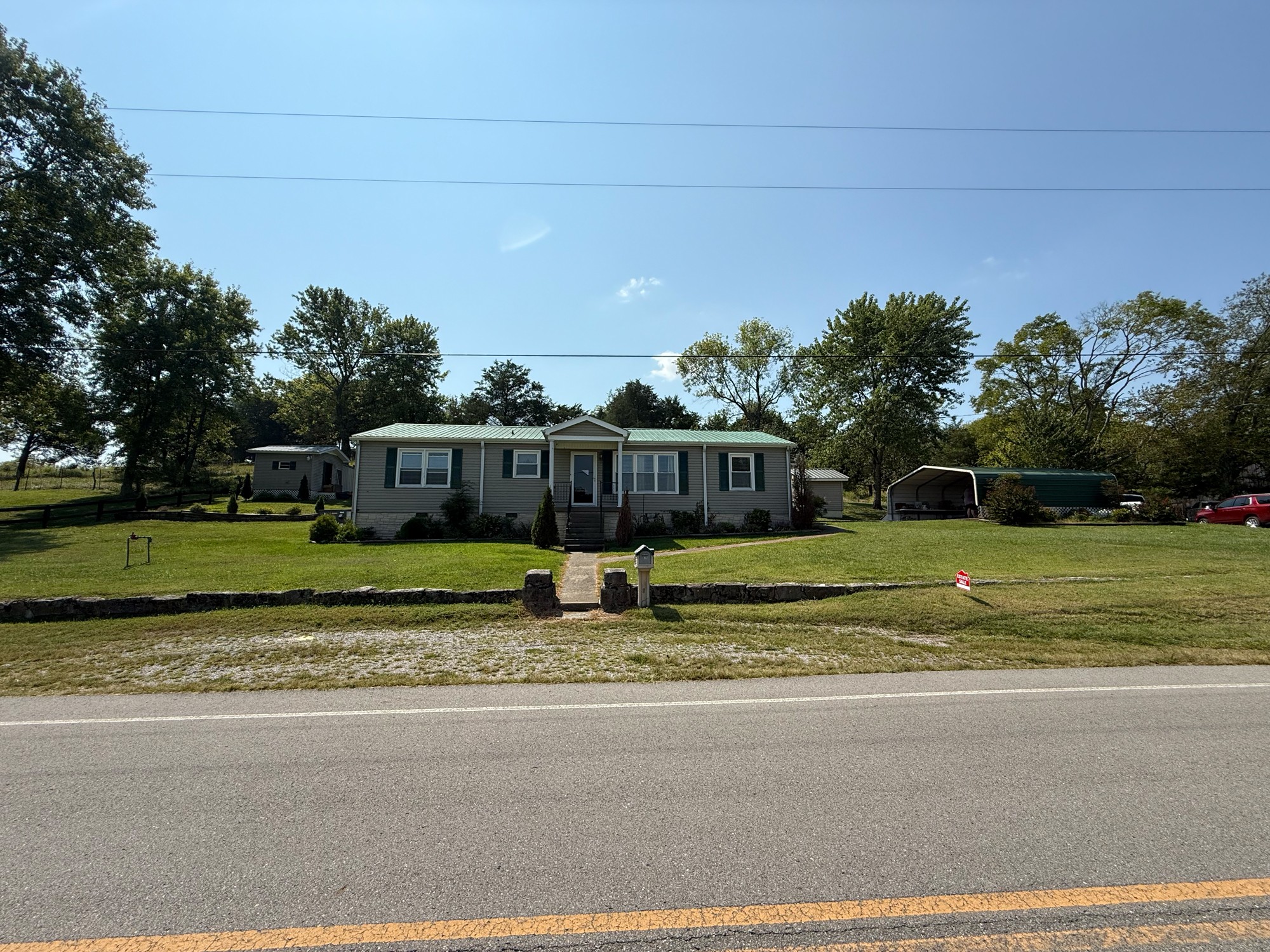 636 Old Alexandria Road Watertown, TN 37184 - Photo 6 of 8 a view of a house with a big yard