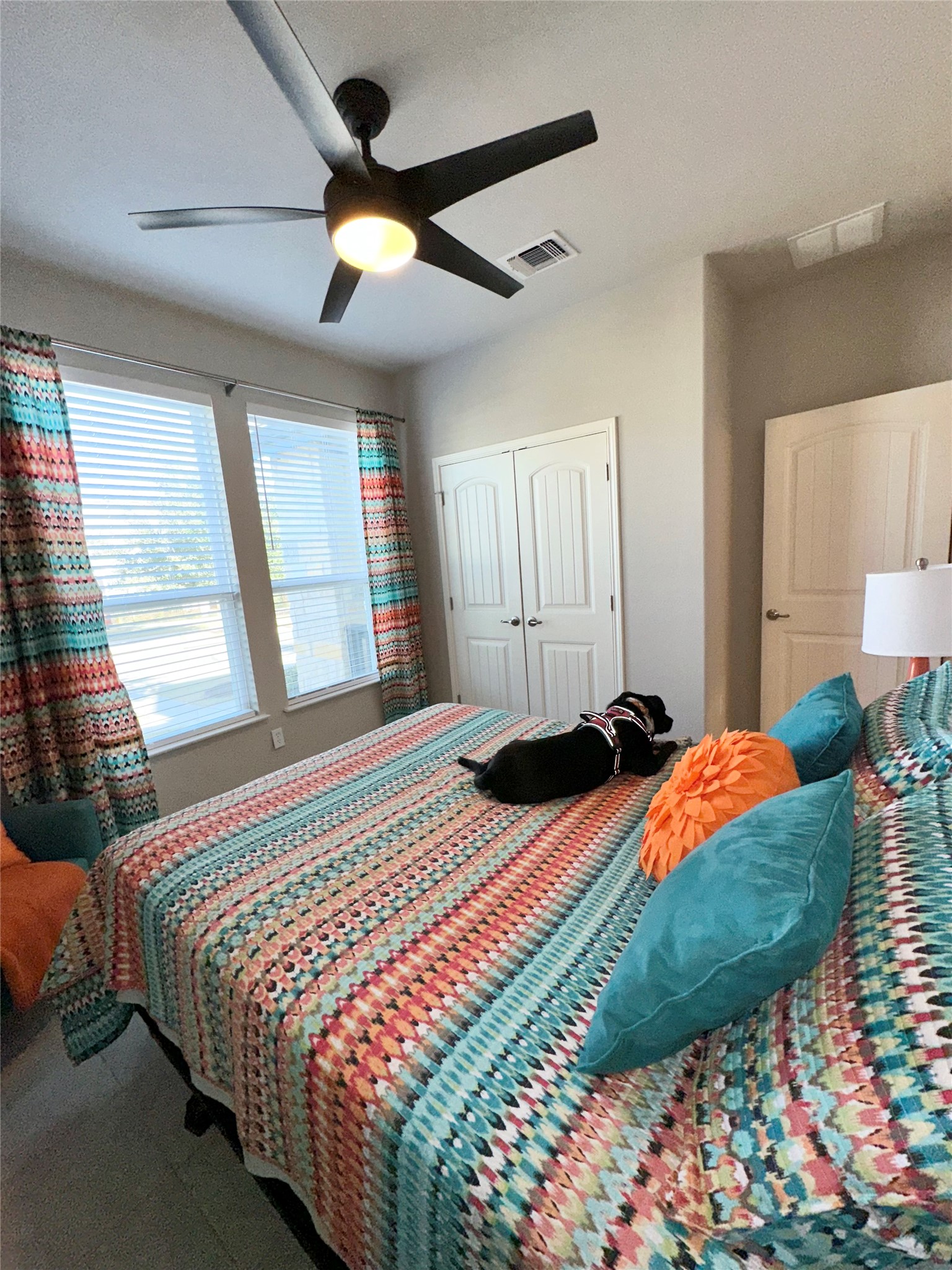 5721 Baythorne Drive Austin, TX 78747 - Photo 13 of 22 a bedroom with bed and a window