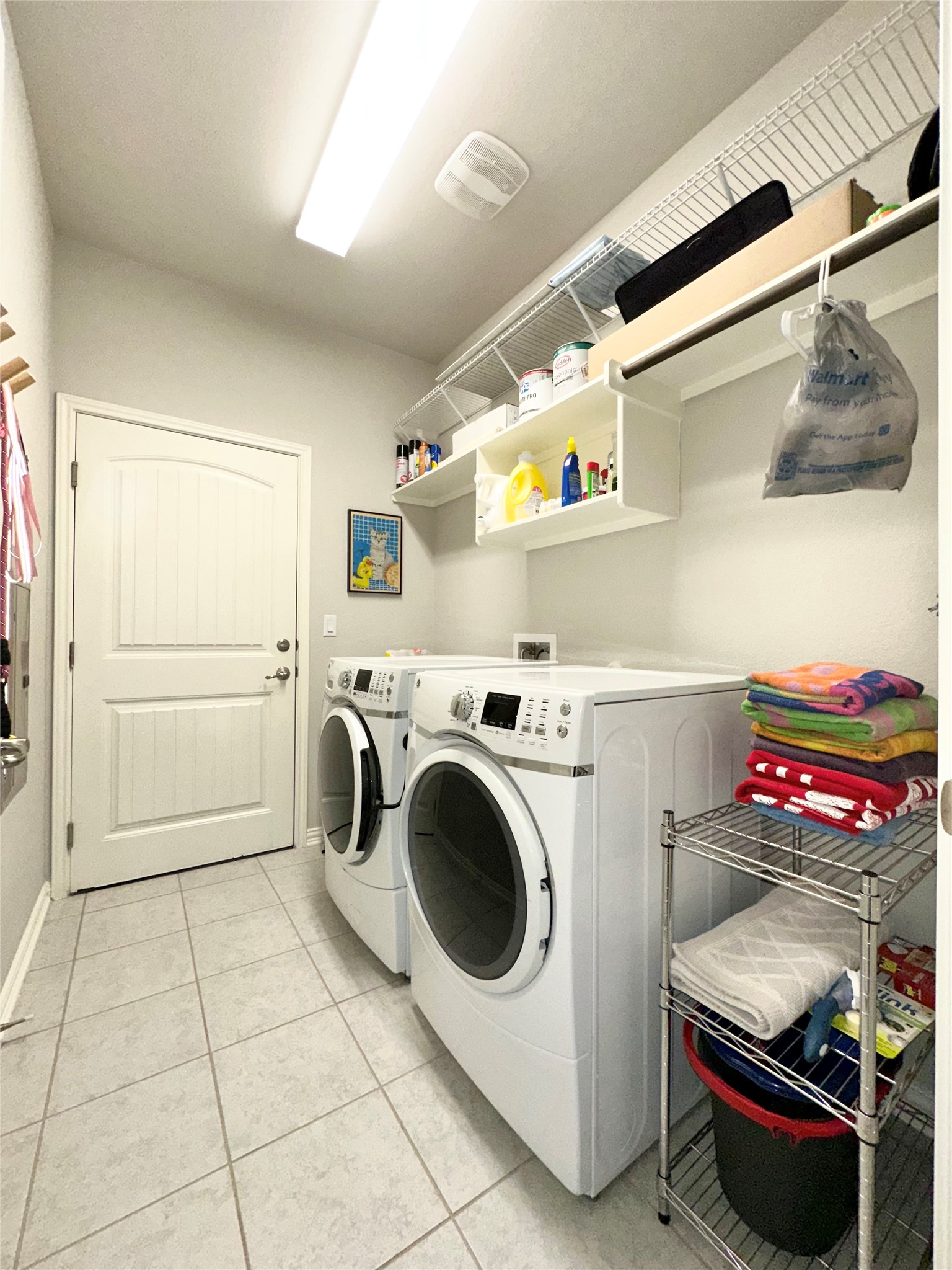 5721 Baythorne Drive Austin, TX 78747 - Photo 18 of 22 a utility room with dryer and washer