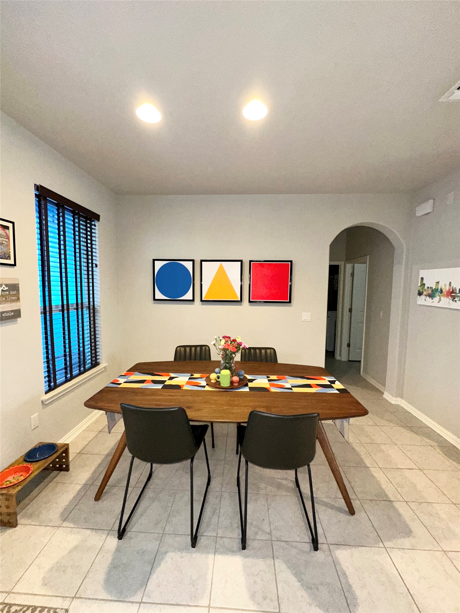 5721 Baythorne Drive Austin, TX 78747 - Photo 6 of 22 a table and chairs in a room