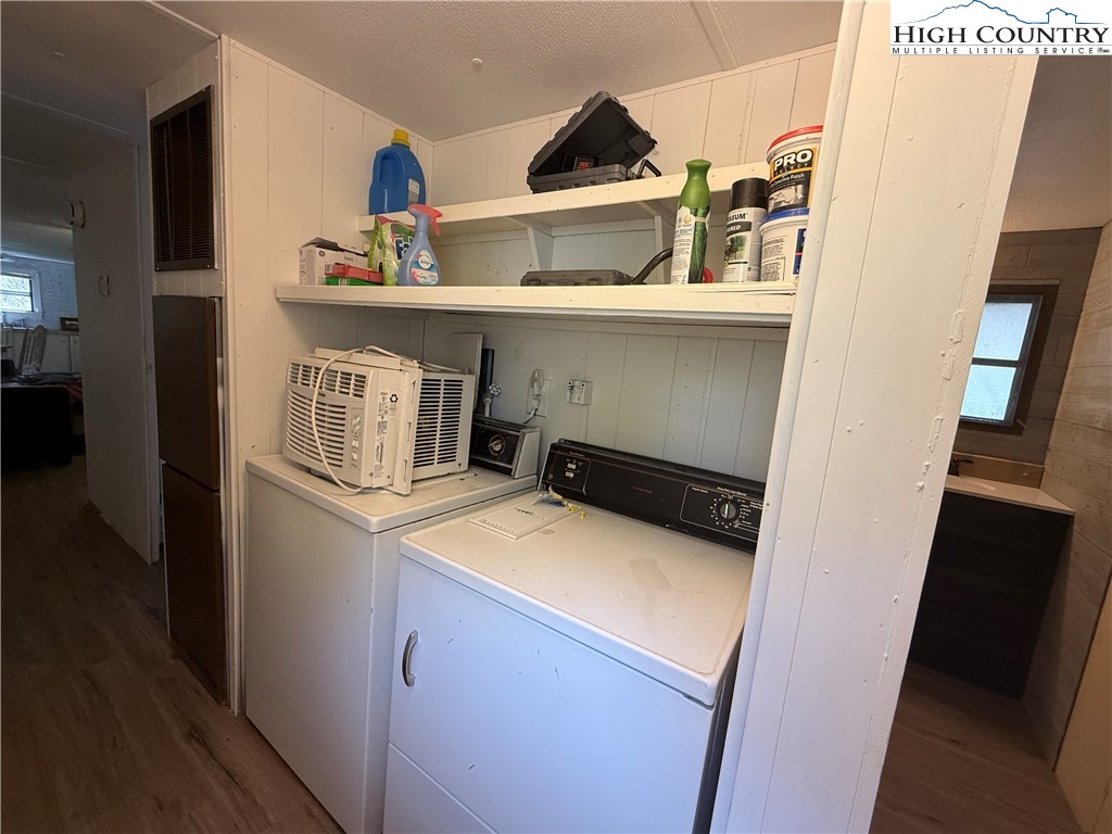 253 Bobby Rash Road Warrensville, NC 28693 - Photo 11 of 15 a utility room with dryer and washer