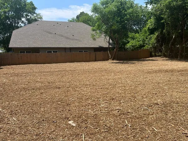 a house with trees in front of it