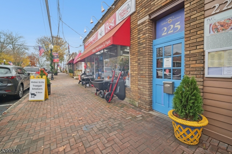 246 Main Street, Unit 201 Chatham, NJ 07928 - Photo 18 of 28 a view of street with sitting area
