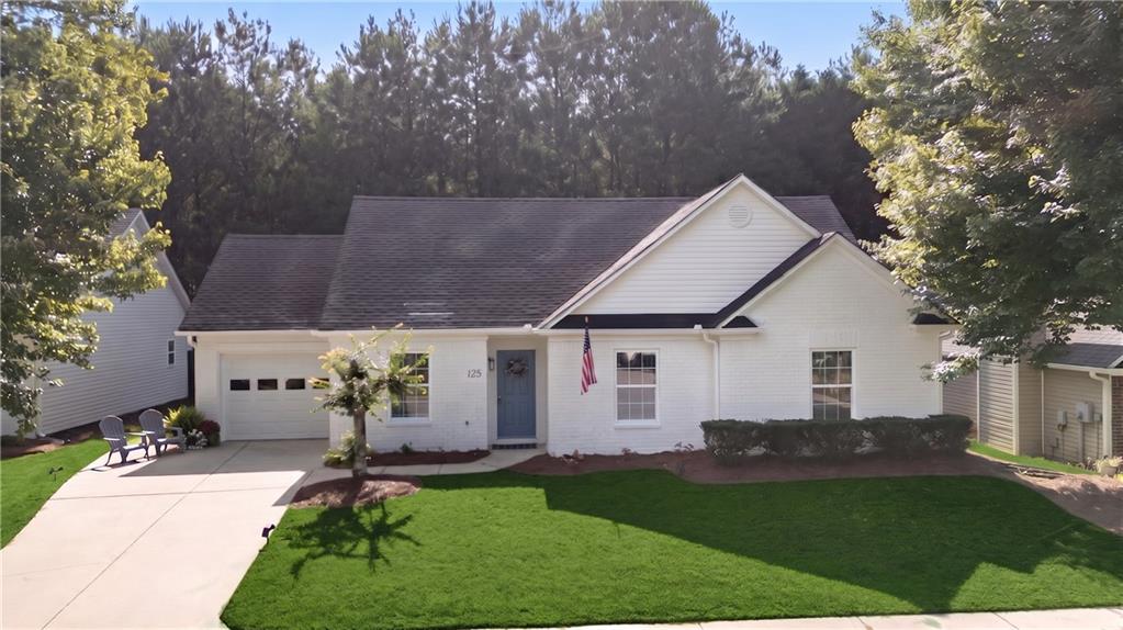 125 Pine Ridge Trace Athens, GA 30605 - Photo 26 of 28 a view of a house with backyard and sitting area