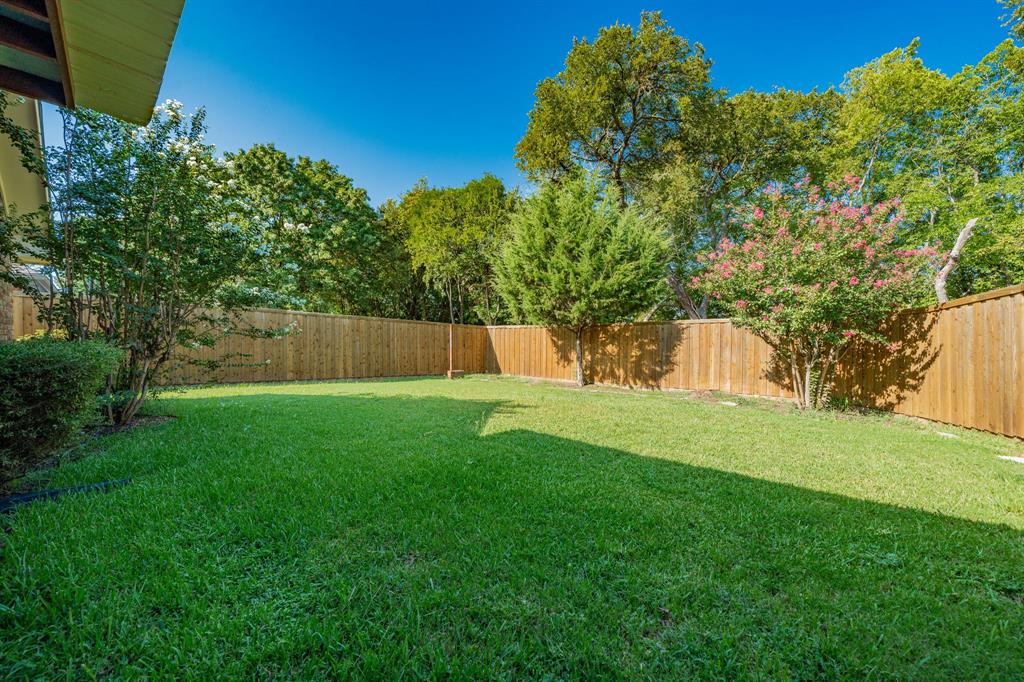 8304 Navigation Drive Rowlett, TX 75088 - Photo 38 of 40 View of fenced backyard