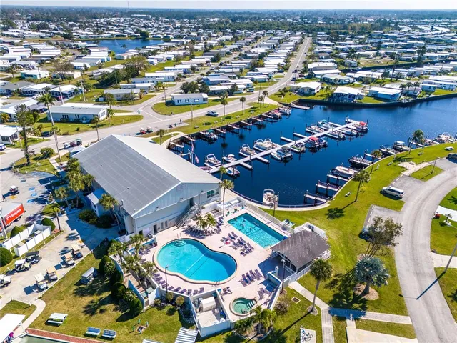 an aerial view of a pool patio swimming pool and outdoor space