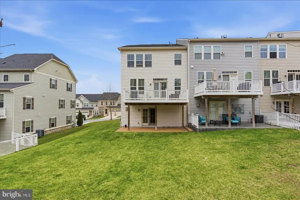 a view of a building with a yard