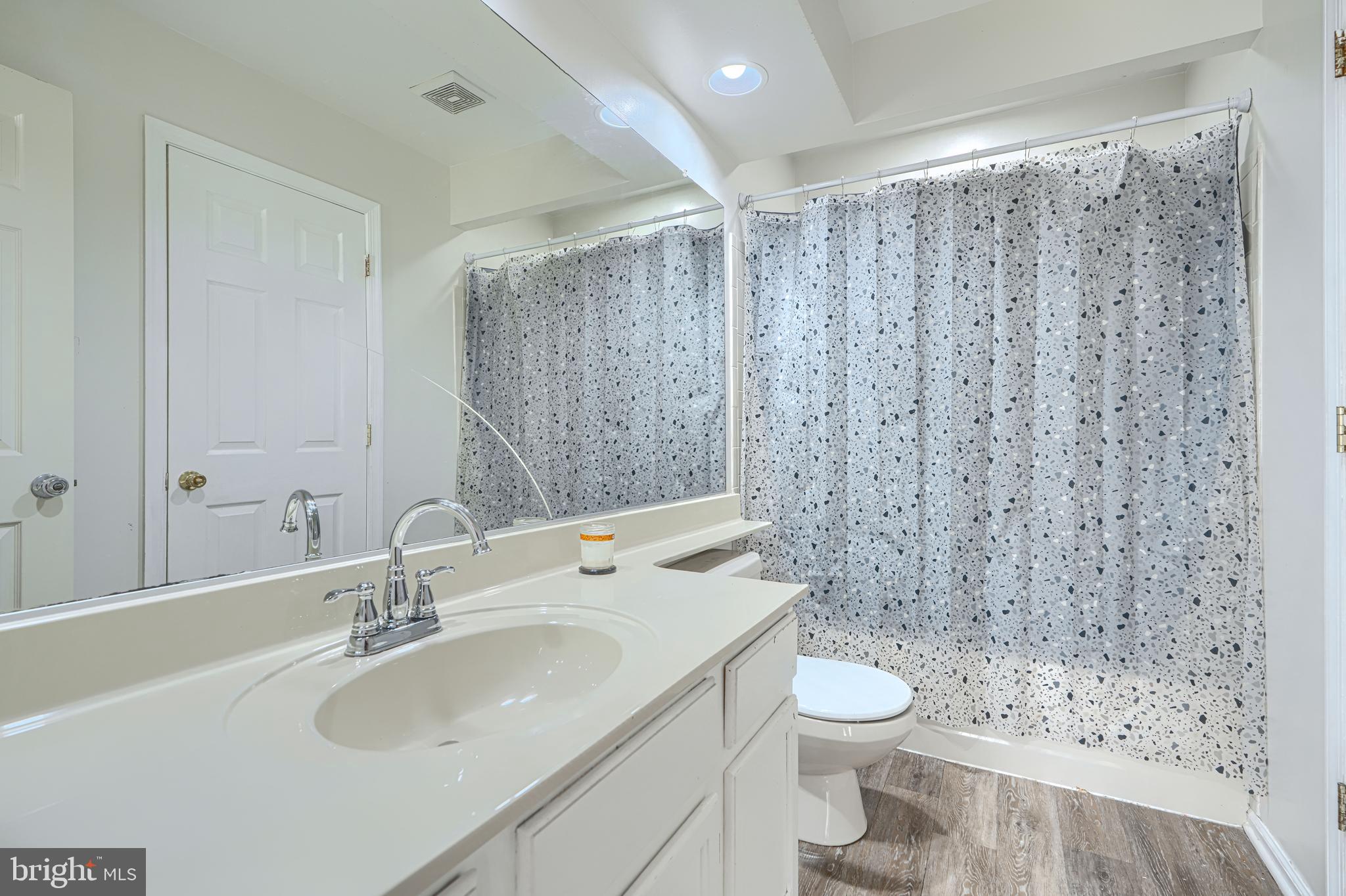 315 Overlea Place Abingdon, MD 21009 - Photo 27 of 56 a bathroom with a sink a toilet and shower