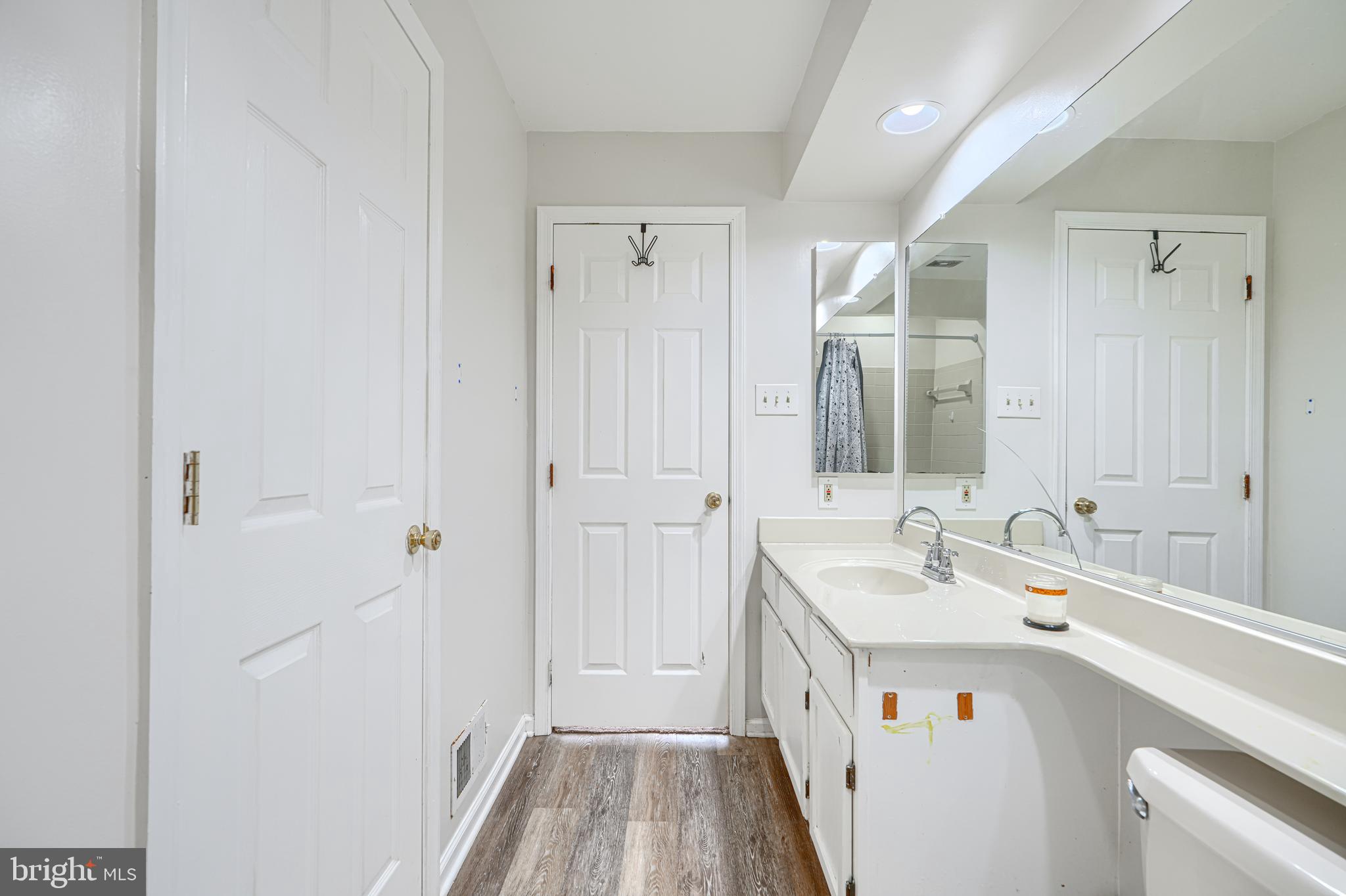 315 Overlea Place Abingdon, MD 21009 - Photo 30 of 56 a bathroom with a sink a mirror and a shower